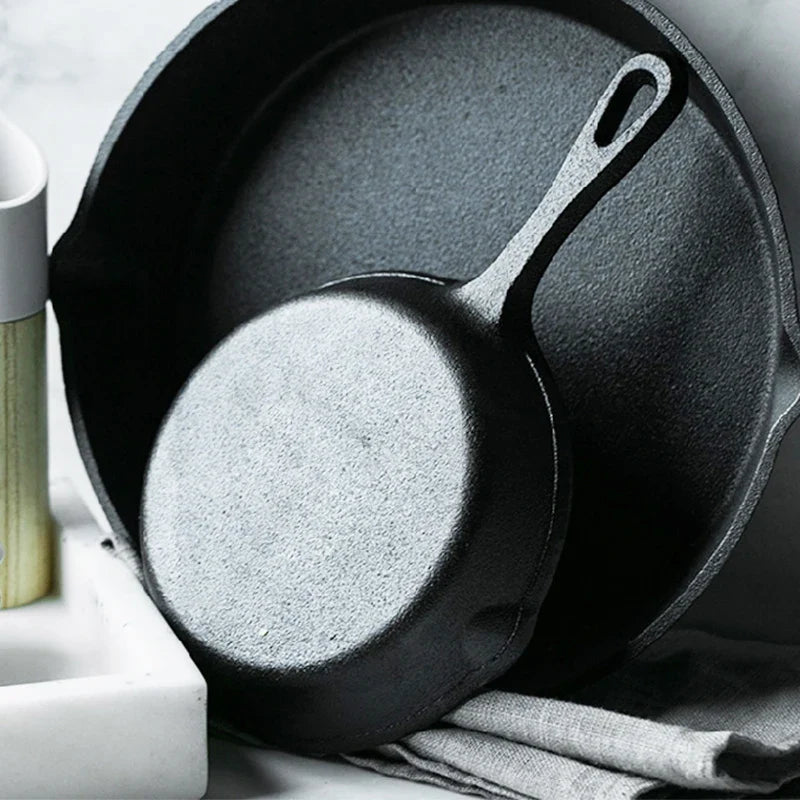 EcoNest Kitchen non-stick cast iron frying pan set with spouts, available in 14cm, 16cm, and 20cm sizes, suitable for gas and induction stoves.