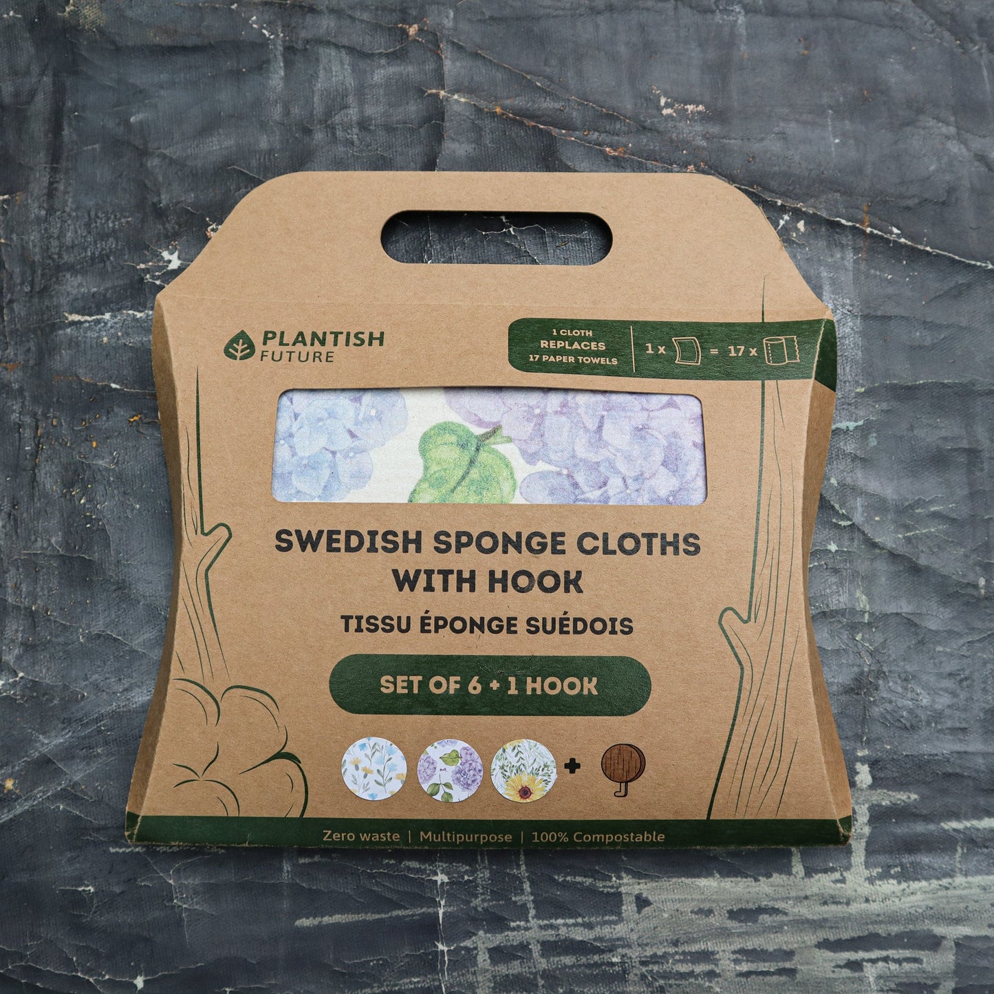 Packaging of Swedish sponge cloths with hook on a textured dark background