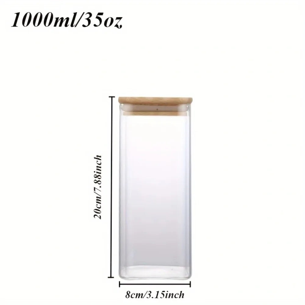 Stackable glass food storage jars with bamboo lids, sealed, transparent square containers for kitchen pantry and counter organization.