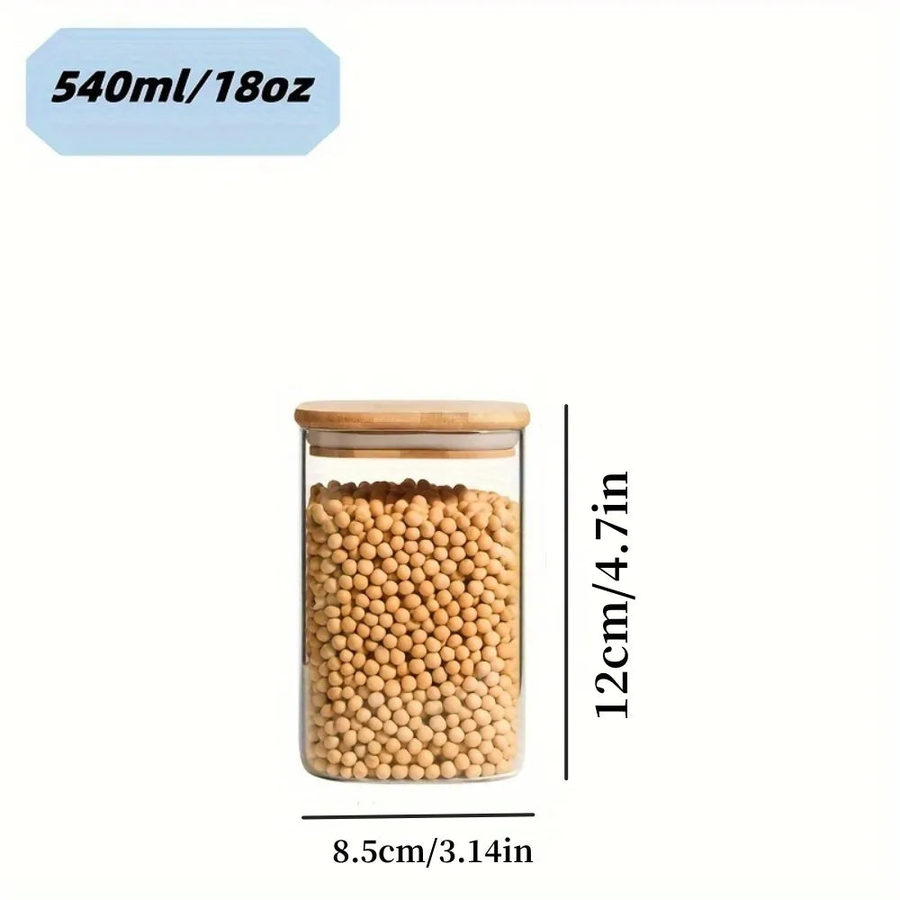 Stackable glass food storage jars with bamboo lids, sealed, transparent square containers for kitchen pantry and counter organization.