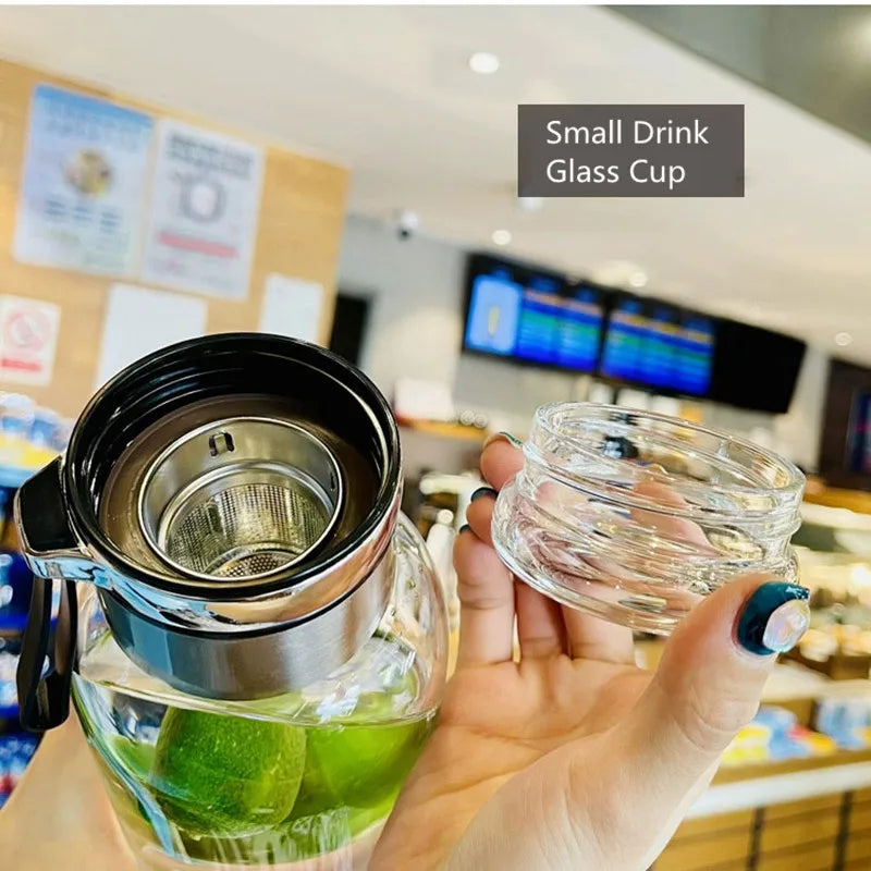 1-liter glass water bottle with cloth sleeve and tea infuser, ideal for outdoor or office use