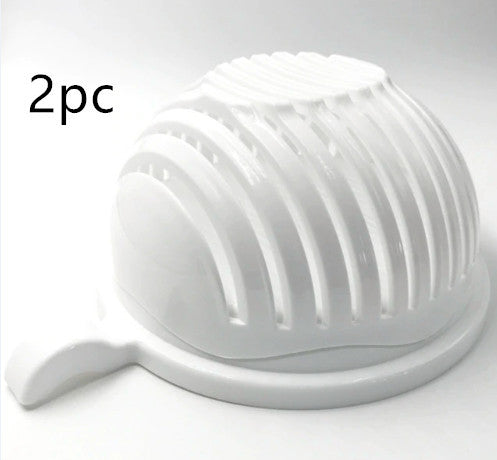 White kitchen tool with a handle on a light gray background