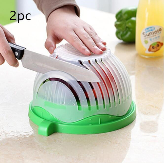 Vegetable chopper with sliced vegetables on a kitchen counter
