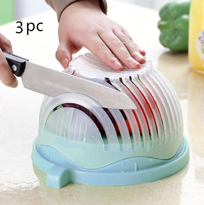 Vegetable chopper with sliced vegetables on a kitchen counter