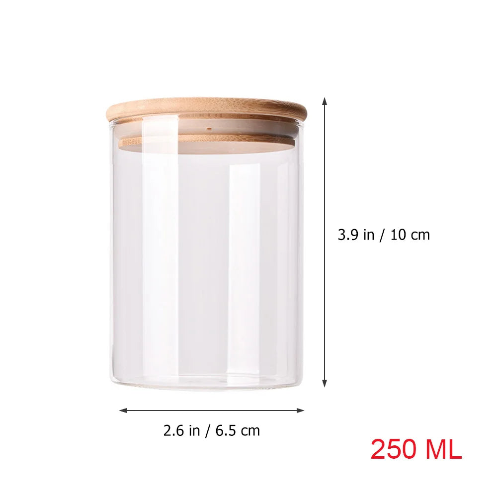A collection of EcoNest Kitchen glass canisters with wooden lids, showcasing airtight seals for optimal food storage and organization.