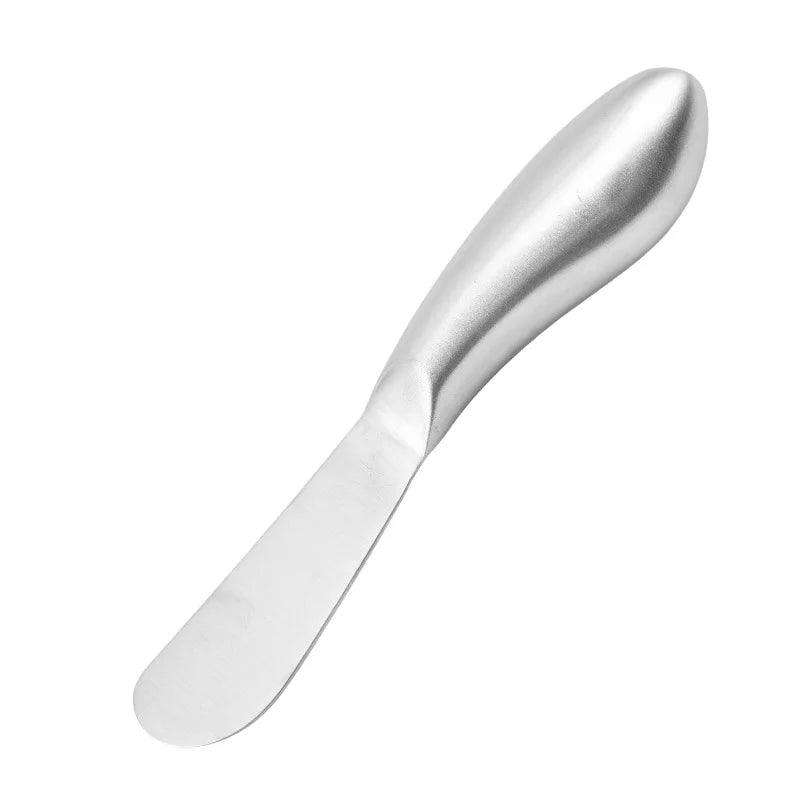 Silver spoon on a white background