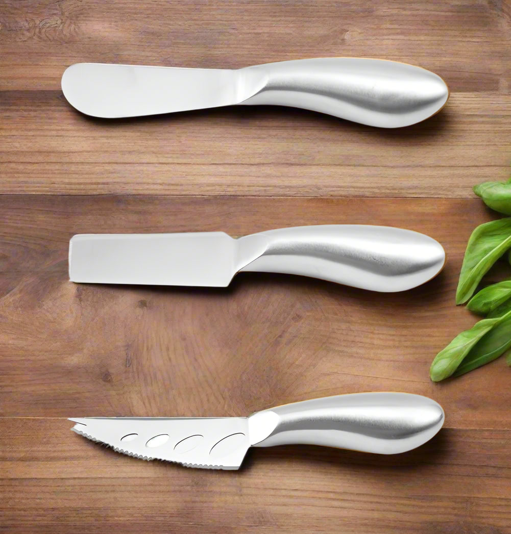 Three different types of cheese knives with measurements on a white background