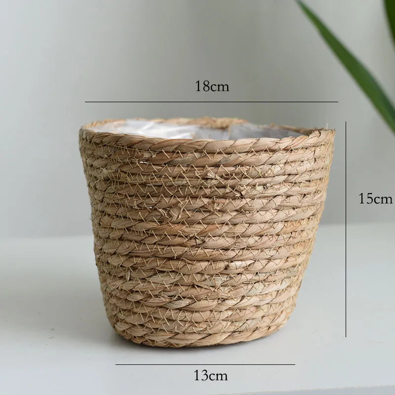 Woven plant pot with dimensions on a plain background