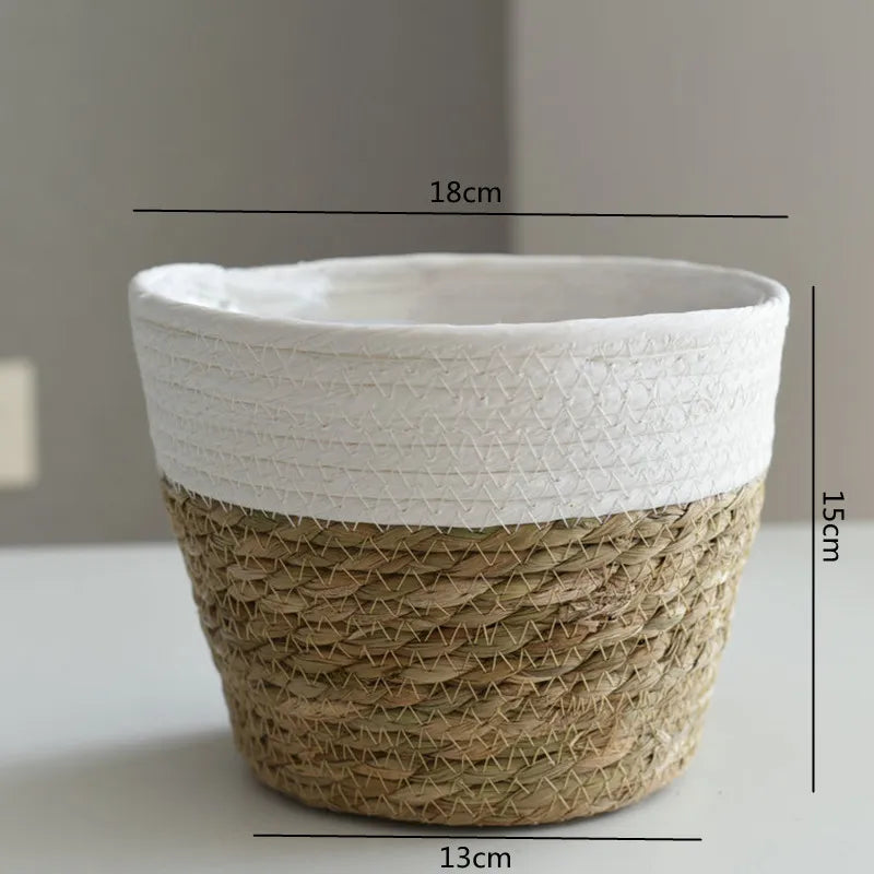 Woven plant pot with measurements on a plain background