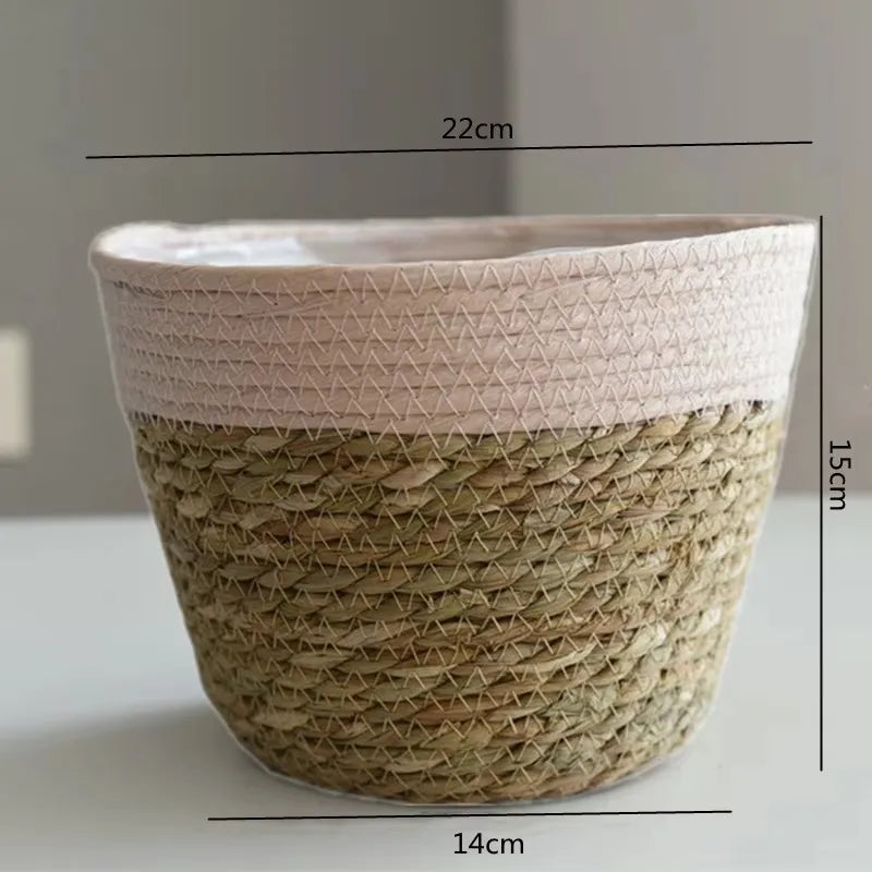 Woven basket with pink woven lid and measurements on a neutral background