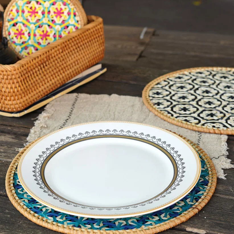 Decorative plate with intricate design on a woven placemat