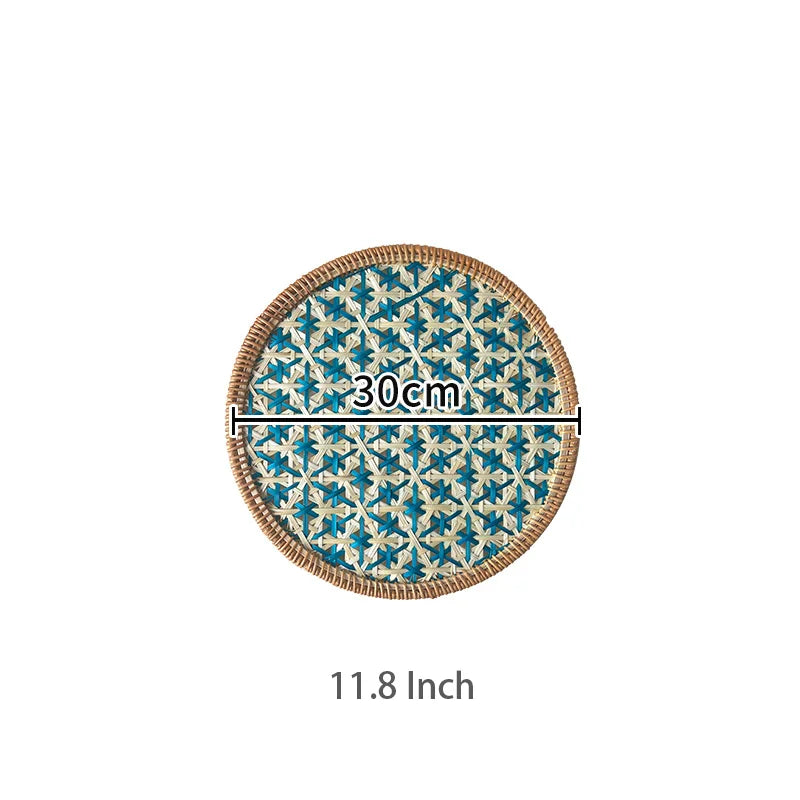 Round decorative plate with blue and beige pattern and measurement text on a white background