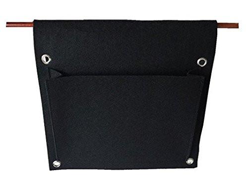 Eco-friendly 2-pocket saddlebag planter hanging on a balcony railing with herbs growing from both sides