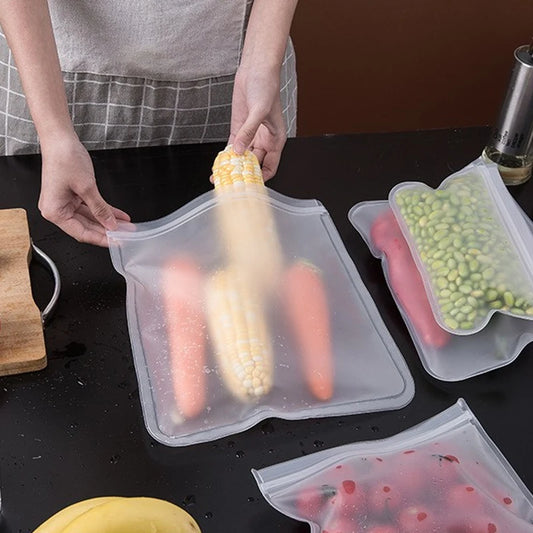 EcoNest Kitchen reusable silicone Ziplock bags (1/2/3/5 pcs), leakproof and BPA-free, ideal for storing meat, fruits, and veggies in a white transparent design."