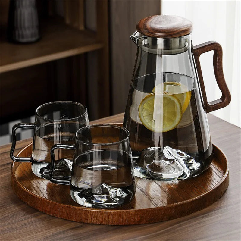 Large capacity 2000ML glass water jug with wooden handle and filter lid, heat-resistant and eco-friendly for hot or cold drinks.