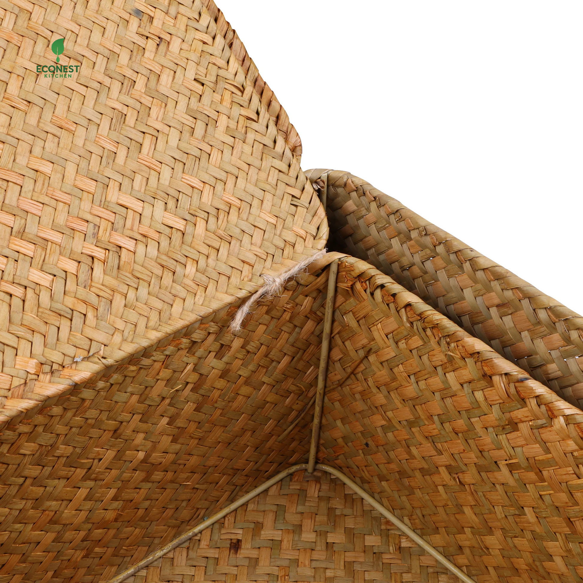 Close-up of a woven straw hat with a visible brand logo in the corner.