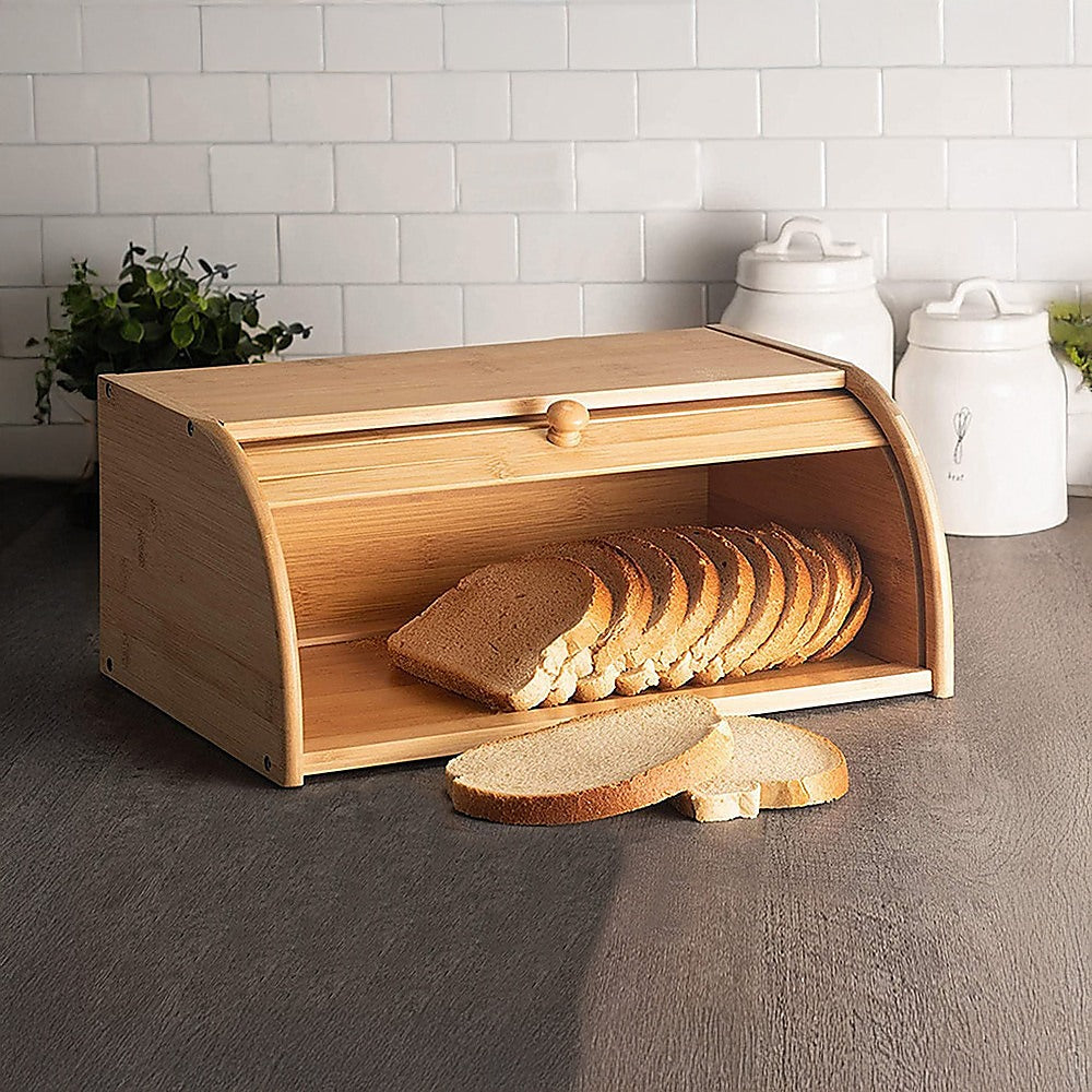 Wooden bread box with sliced bread on a kitchen counter
