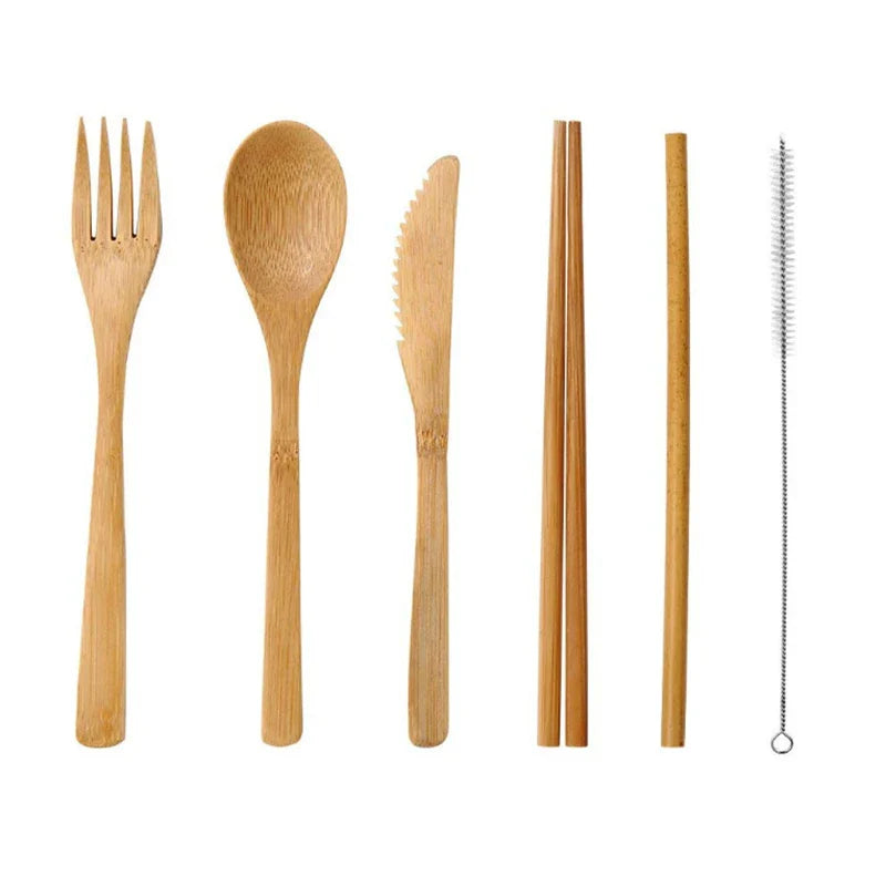 Eco-friendly bamboo travel cutlery set with reusable fork, spoon, and knife in a carrying pouch.