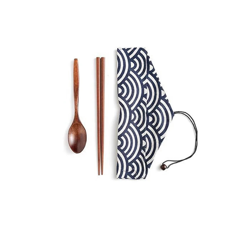 Eco-friendly bamboo travel cutlery set with reusable fork, spoon, and knife in a carrying pouch.