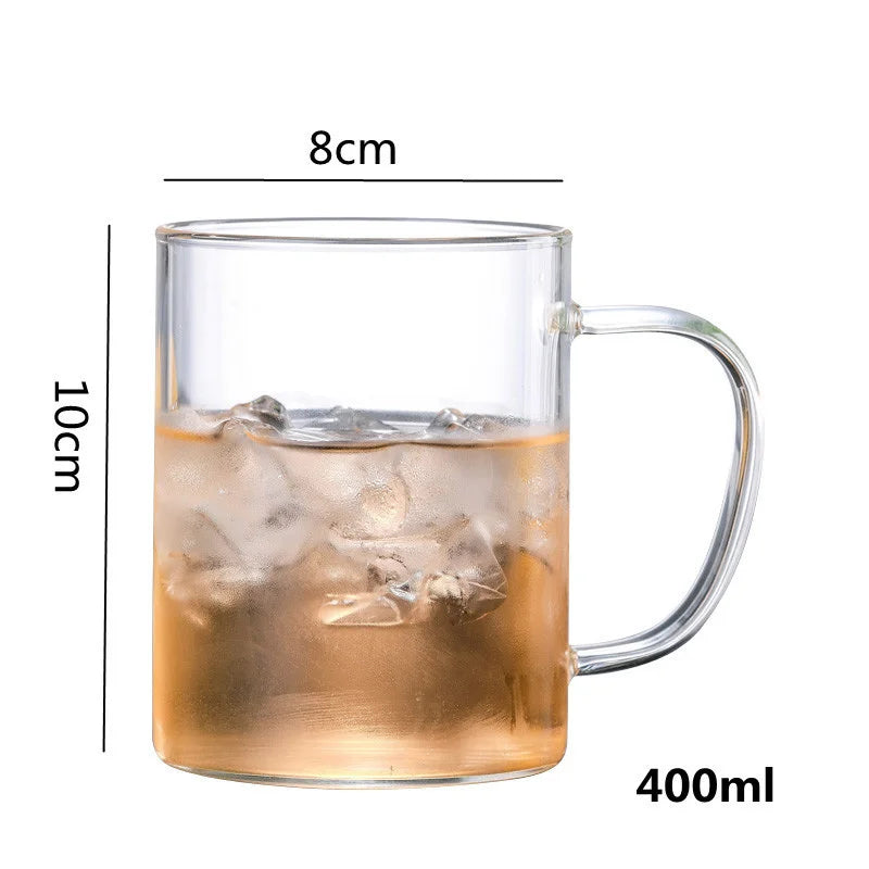 High borosilicate glass travel mug with tea infuser, filter, and sturdy handgrip, ideal for hot and cold beverages.