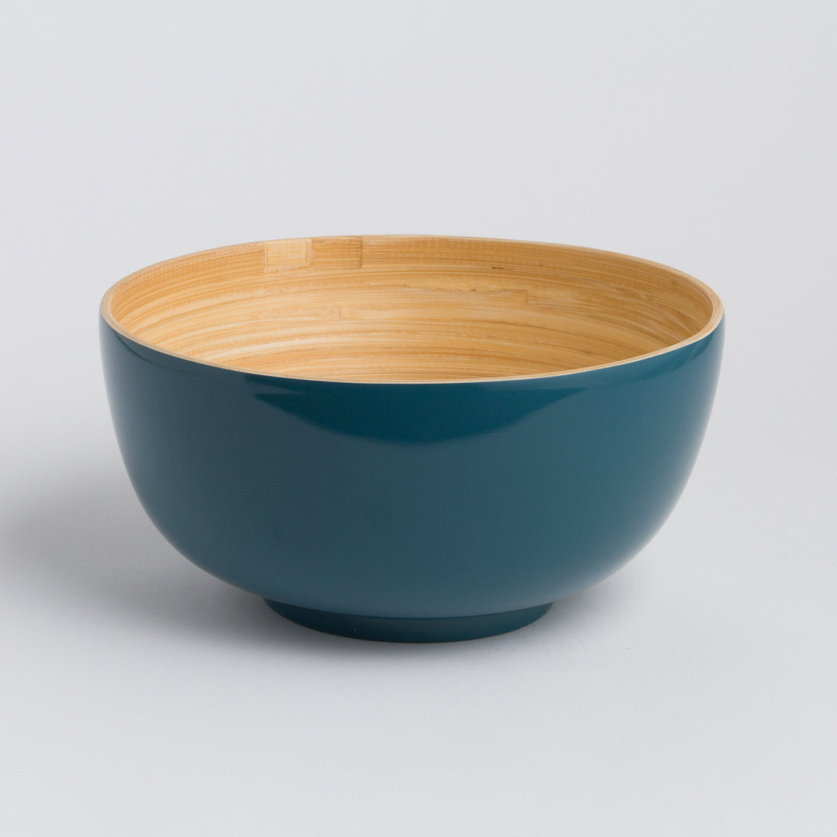TCHON Bamboo Salad Bowl (Medium) in teal color with a bamboo interior, perfect for serving salads or pasta.