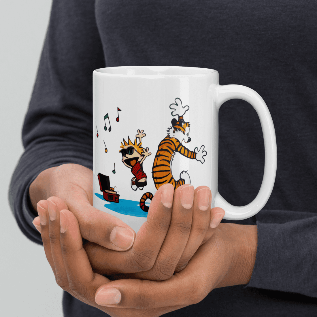 Calvin & Hobbes Dancing with Record Player Mug - Ceramic, Dishwasher & Microwave Safe, eco-friendly and reusable for sustainable kitchen use.