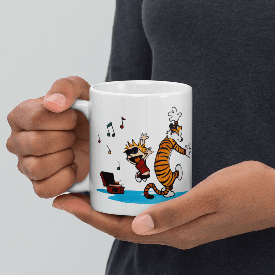 Calvin & Hobbes Dancing with Record Player Mug - Ceramic, Dishwasher & Microwave Safe, perfect for a sustainable kitchen.