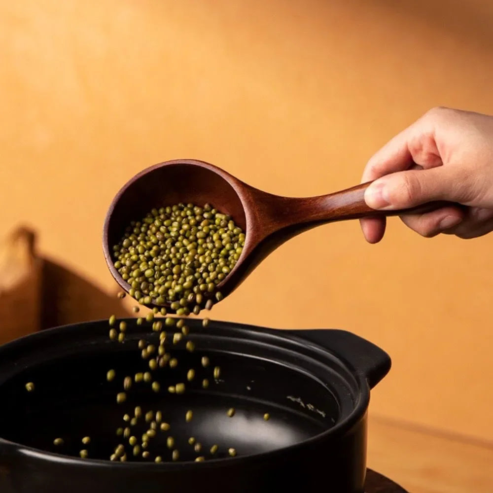 Large Japanese-style wooden spoon for ramen, rice, and water serving, made from natural safe wood, eco-friendly kitchen utensil.