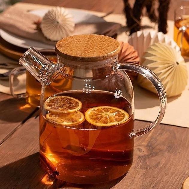Thermo Glass Teapot 54 Fl Oz | High temperature and shock resistant with bamboo lid and organic materials for sustainable kitchen use.