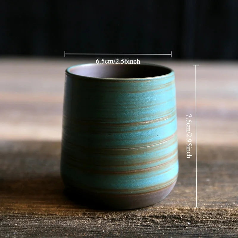 Blue ceramic cup with measurements on a wooden surface