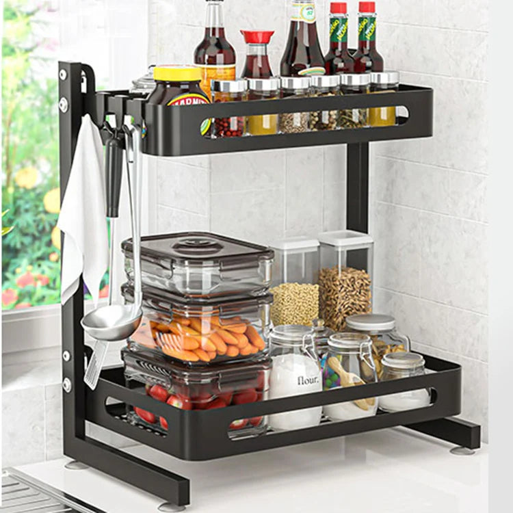 Black 3-tier expandable metal spice rack for kitchen storage and seasoning organization.