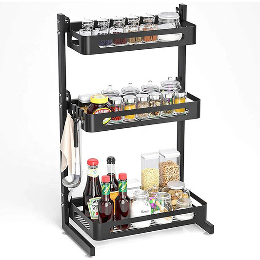 Black 3-tier expandable metal spice rack for kitchen storage and seasoning organization.