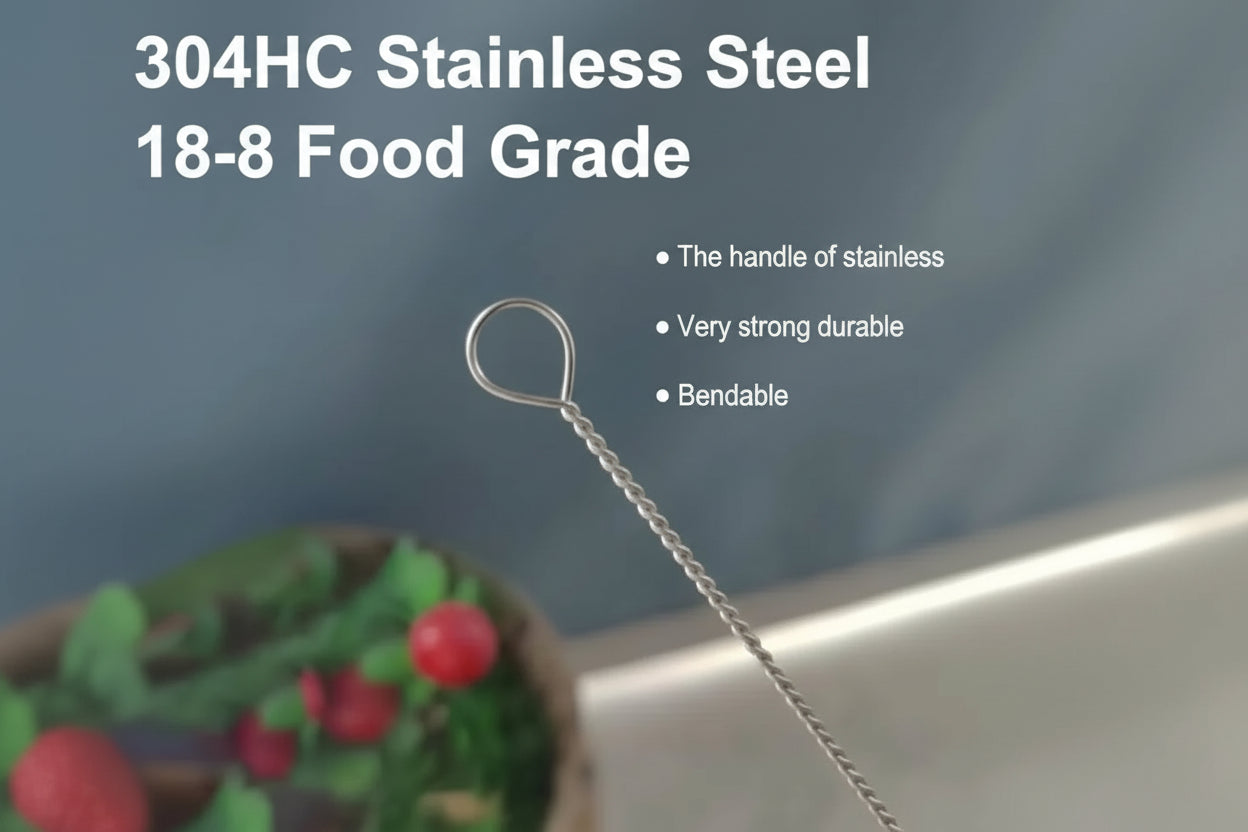 Stainless steel strainer handle with text on a blurred background