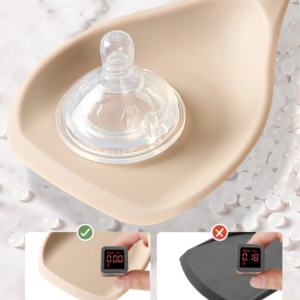 EcoNest Kitchen 4-Piece Silicone Spatula Set with Wooden Handles featuring a unique suction tool on a silicone spatula.