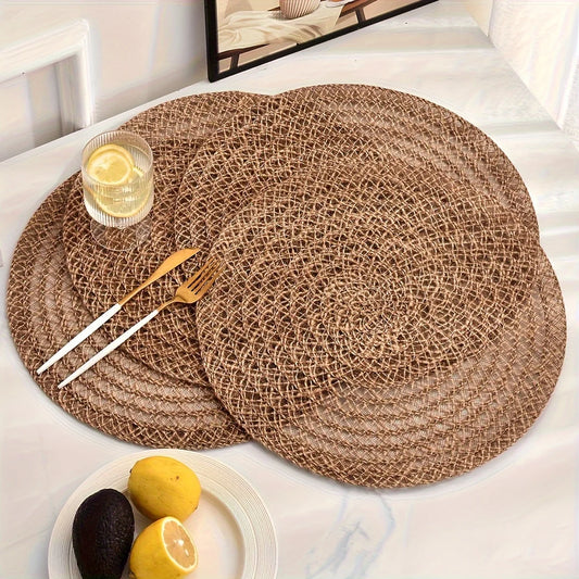 Set of 6 natural woven jute placemats, round, heat resistant and non-slip, ideal for tables at parties, weddings, and casual dining.