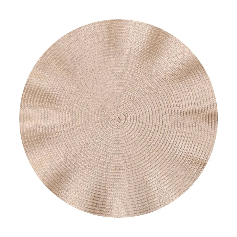 Round woven placemat on a white background