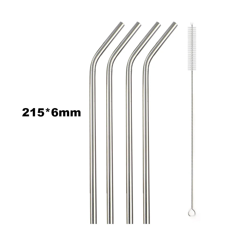 Set of four metal straws with a cleaning brush on a white background