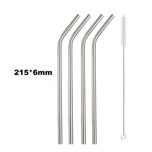 Set of four metal straws with a cleaning brush on a white background