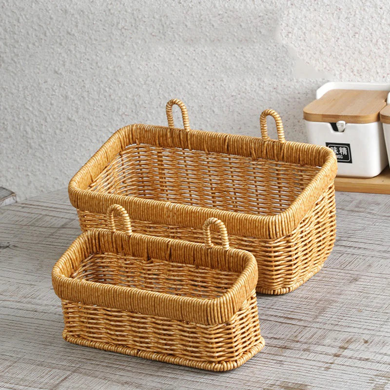 Two woven baskets on a wooden surface with a neutral background