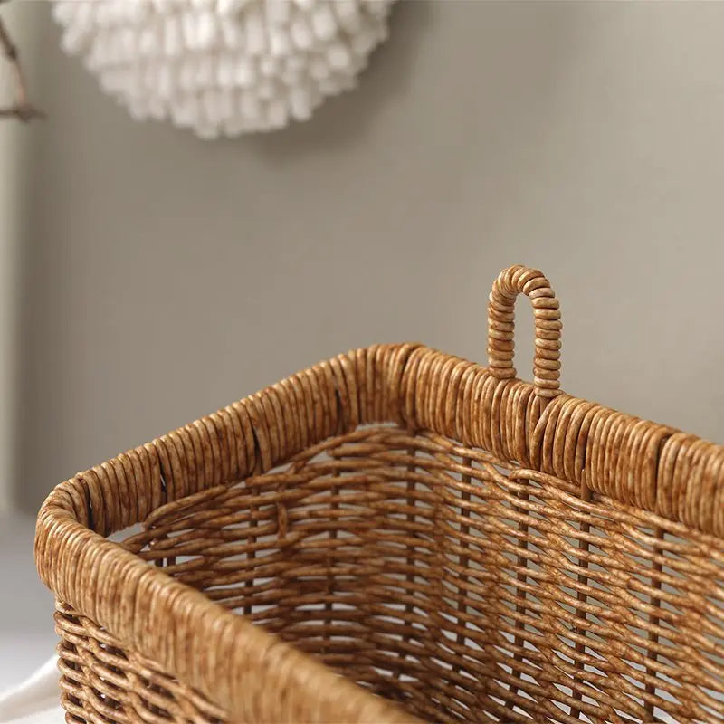 Wicker basket with handles on a neutral background