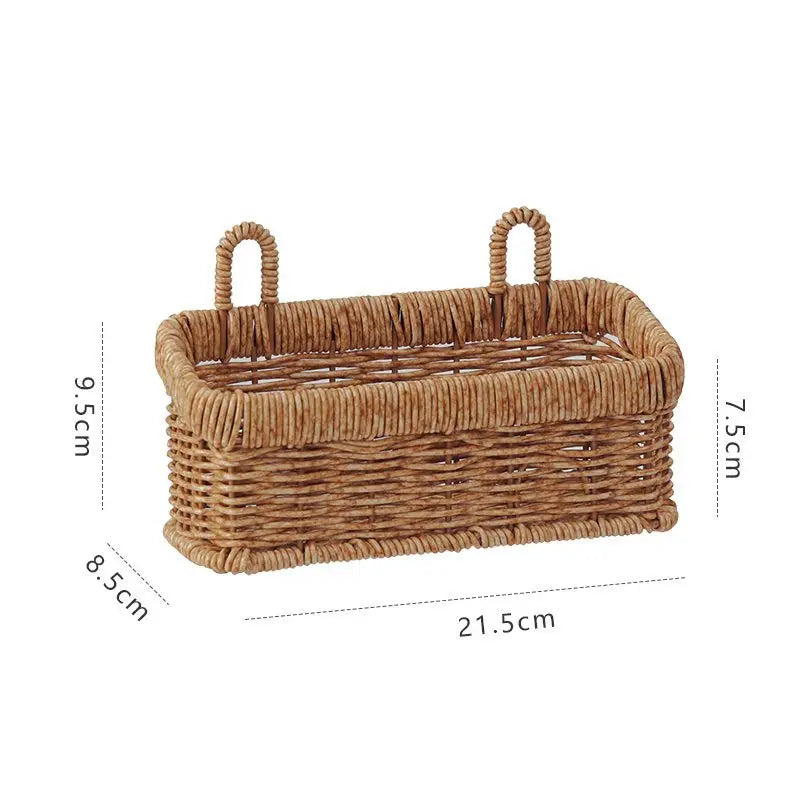 Wicker basket with handles and dimensions on a white background