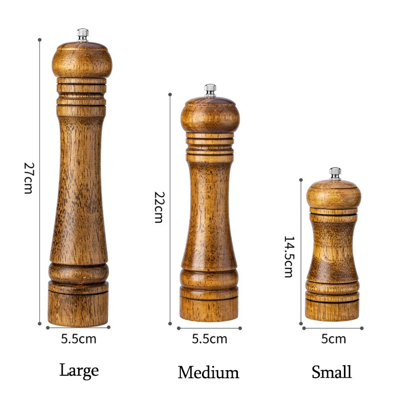Three wooden pepper mills with measurements on a white background