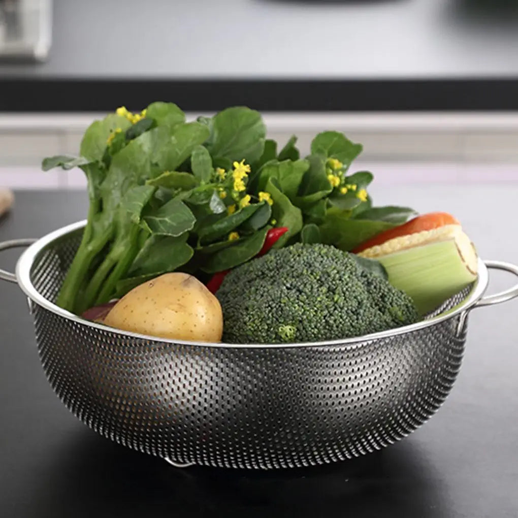 Stainless steel fine mesh strainer and colander set with handles and resting base for kitchen drainage and rinsing tasks.