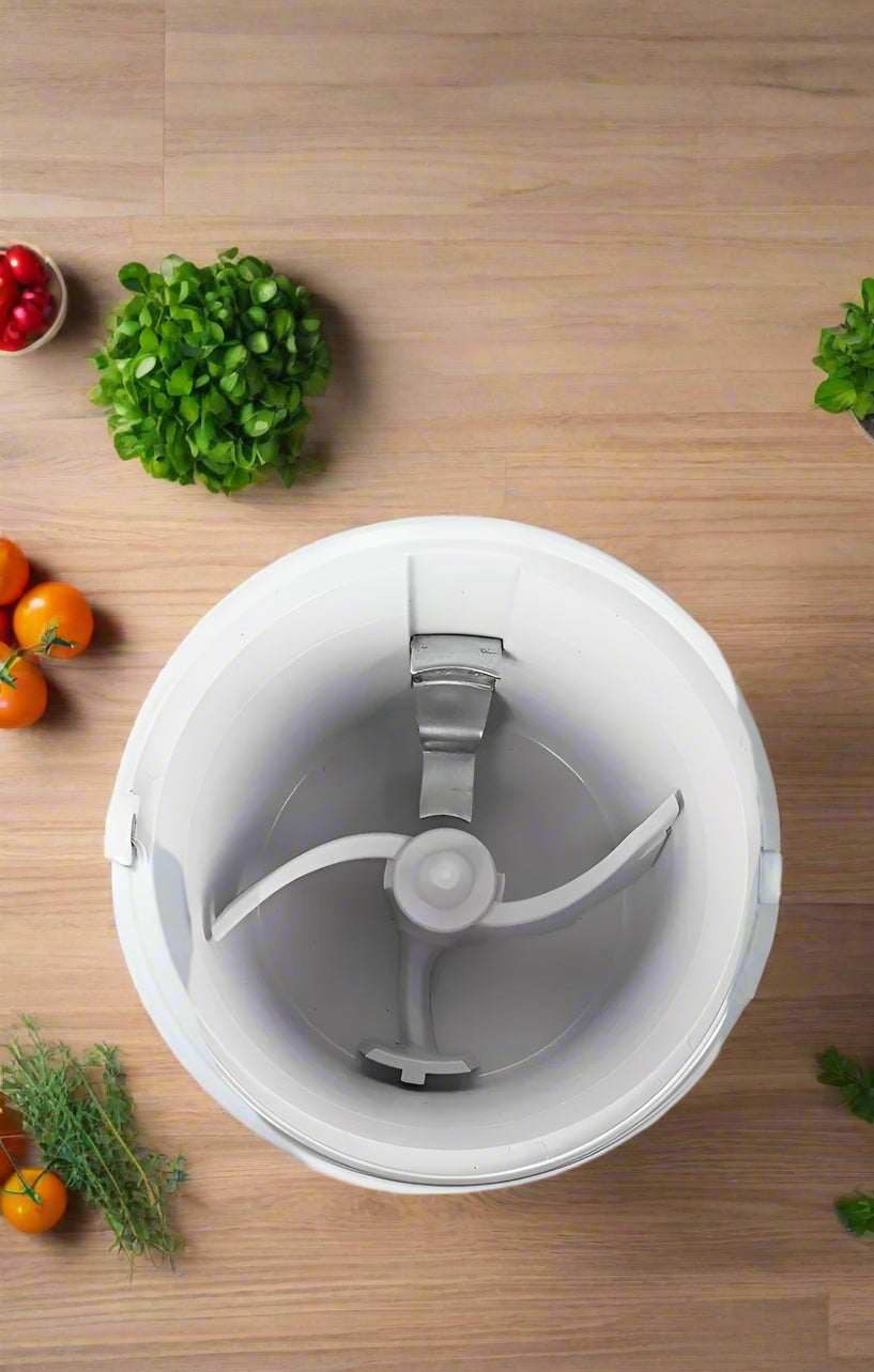 Envitek Recycle Food Machine in a modern kitchen setting, showcasing its sleek black design and stainless steel grinding chamber for effective food waste composting.