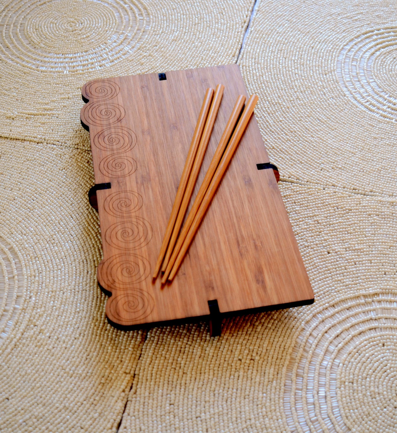 Engraved Bamboo Sushi Board with chopsticks These boards are made of three pieces that slot together. 