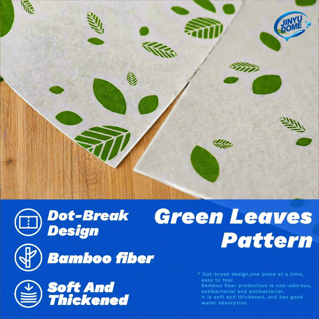 20 Pcs Reusable Bamboo Fiber Cleaning Cloths stacked in a roll on a kitchen countertop.