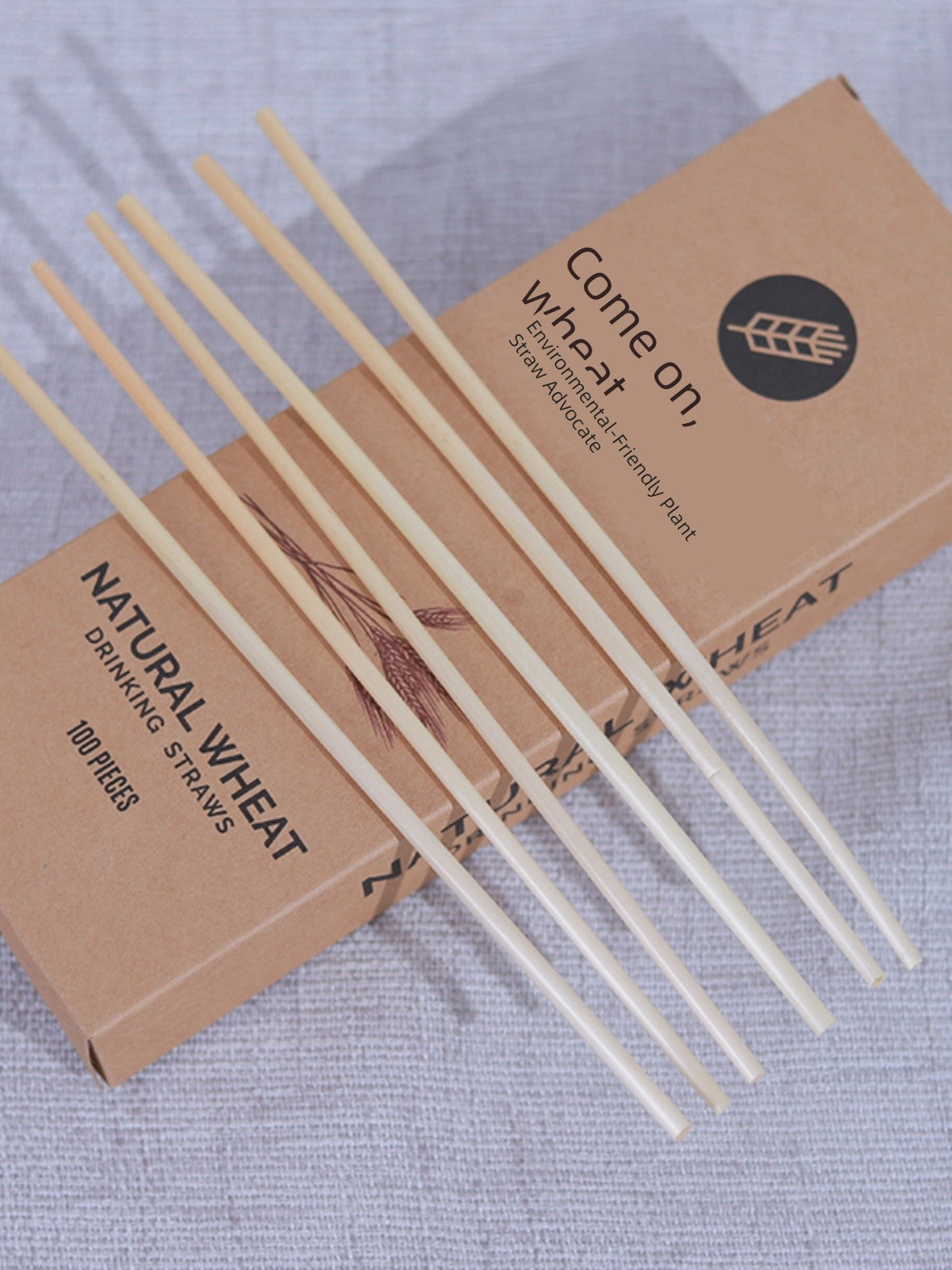 Natural Wheat Straw Degradable Straws displayed in a boxed package.