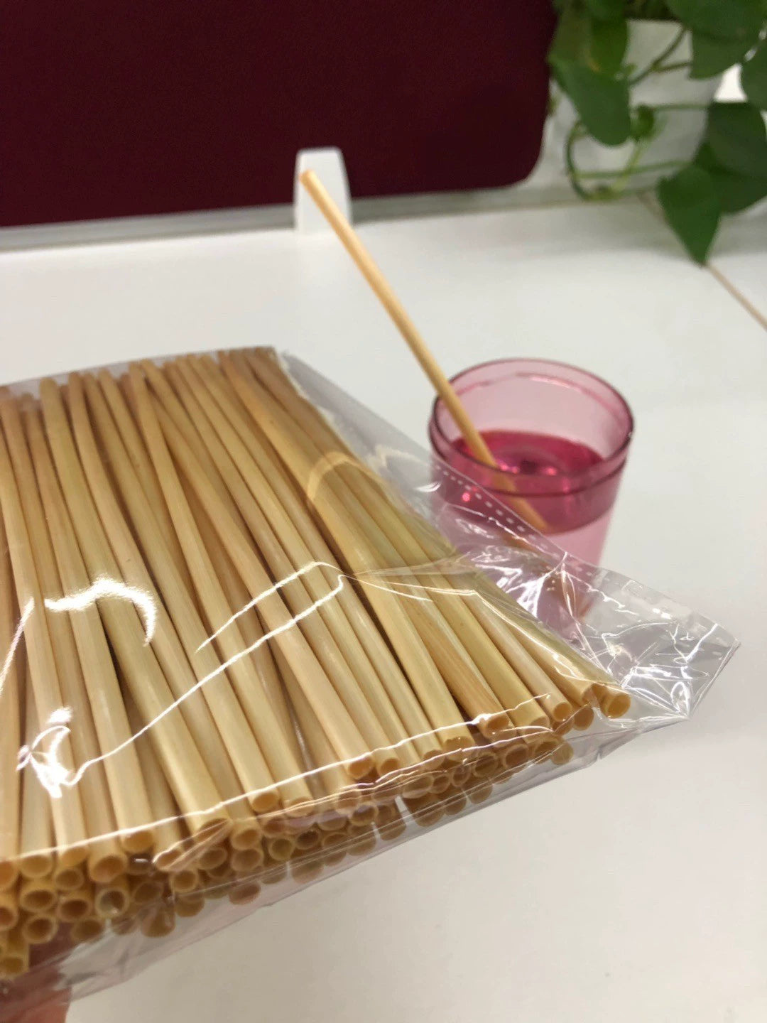 Natural Wheat Straw Degradable Straws displayed in a boxed package.