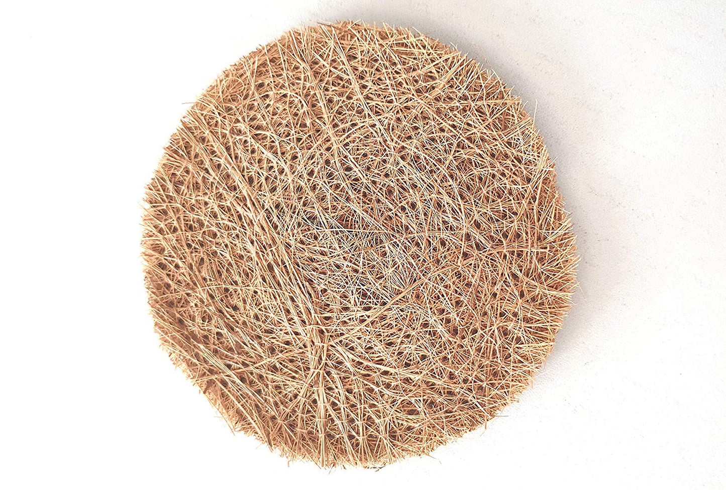 100% natural coconut coir utensil scrub in a circular design, eco-friendly dish cleaner made from sustainable coir fiber, perfect for non-stick cookware and zero-waste kitchens.