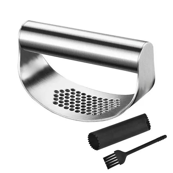 Stainless steel garlic press with black brush on a white background